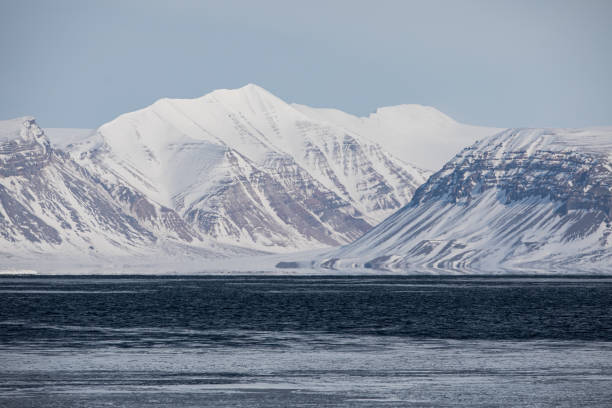istock Frozen mountains in Svalbard, Norway. 1473957003