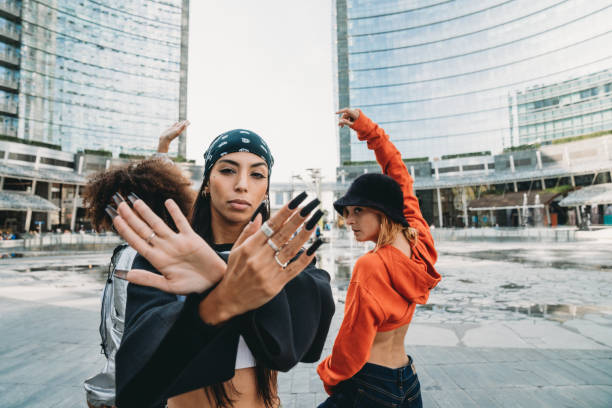 istock Three female dancer friends are posing in a modern city 1473957533
