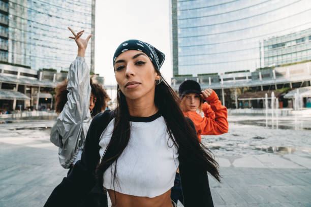istock Three female dancer friends are posing in a modern city 1473957538