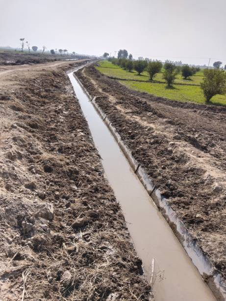 Watercourse lined-watercourse irrigation- watercourse irrigation-course drain open watercourses agriculture land irrigation-channel water course cours deau corriente agua image curso-agua photo stock photo