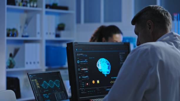 istock Medical laboratory scientist studying patient's brain mri on computer, diagnostics 1473960676