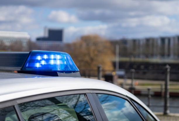 istock Blue Flash Light Of Police Car 1473963650