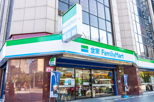 Taipei, Taiwan- August 29, 2021: Storefront view of FamilyMart convenience stores chain in downtown Kaohsiung, Taiwan.