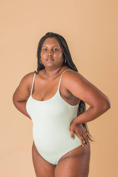 istock curvy plus size model. overweight body acceptance confidence. Latin Cuban body positive unretouched 1473969877