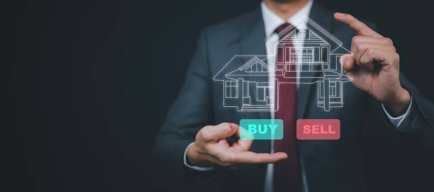 istock Engineering and architecture drawings and mini home model concept, Businessman touch draw a house on the black background, work from home, Real estate offer, Home business buy and sale concept 1473971641