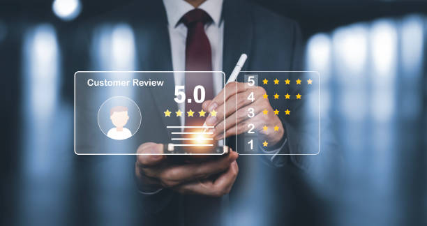 istock Man touch smartphone with Customer review satisfaction feedback survey concept, User give rating to service experience on online application, service leading to reputation ranking of business. 1473971902
