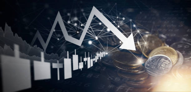 istock Double exposure image of coin stacks on technology financial graph background. 1473971942
