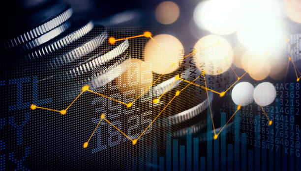istock Double exposure image of coin stacks on technology financial graph background. 1473971953