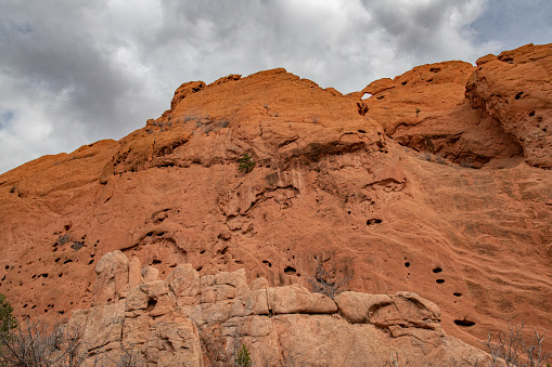 Tall and massive red sandstone formations and \