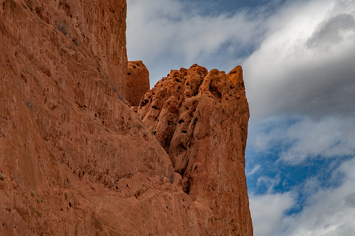 Top of tall and massive red sandstone formation, center looking south, in the Garden of the Gods at Colorado Springs, Colorado in western USA of North America