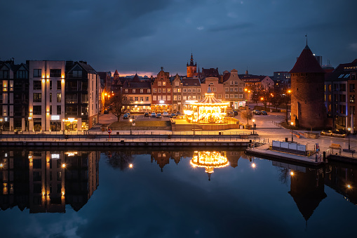 Old town in Gdansk by the Motlawa river at dusk, Poland.