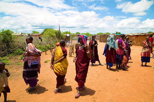 Kenya Africa ,16 oktober 2019 women from the African tribe Maasai in national dress in their village houses made of clay