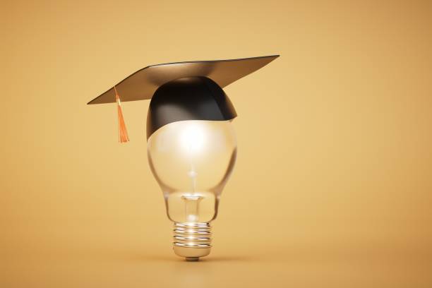 istock the concept of higher education. a light bulb in the master's cap. 3D render 1473982720