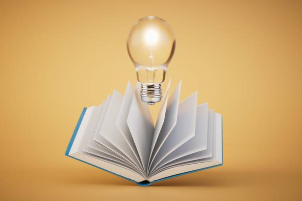 the concept of idea generation. an open book and a burning light bulb on a pastel background. 3D render