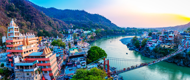 Rishikesh, yoga city India, Ganges River valley, Ganga, Uttarakhand during sunset. Rafting, raft