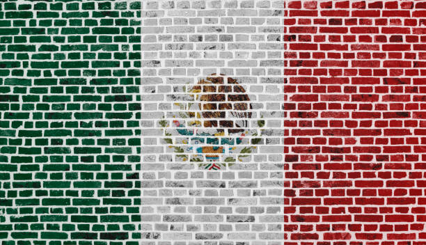 istock Flag of Mexico painted on a brick wall 1473989501