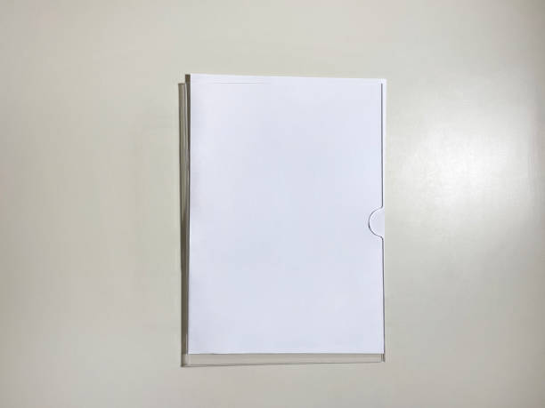 istock Empty white paper page hanging on the wall, placard, poster 1473989544