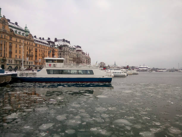 view of ships at harbor during winter - stockholm harbor sweden winter imagens e fotografias de stock