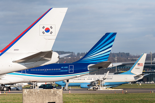 Zurich, Switzerland, January 19, 2023 Korea Boeing 747-8B5, Azerbaijan Airbus A340-600 and United States Boeing C-40 aircraft are parking on the apron during the world economic forum in Davos