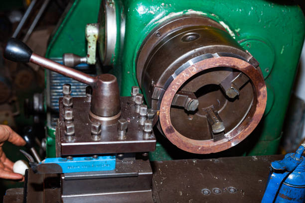 istock Turning a steel billet on a lathe with a cutter. 1473991180
