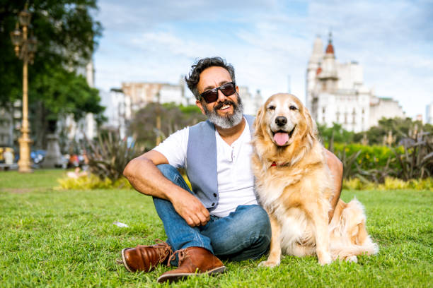 istock Golden retriever portrait with owner 1473994264