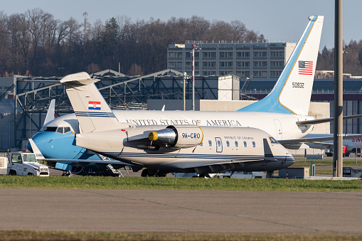 Zurich, Switzerland, January 19, 2023 Croatia Bombardier Challenger 604 and a United States Boeing C-40 government aircraft are parking on the apron during the world economic forum in Davos