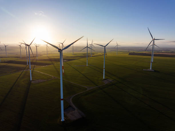 istock Aerial view of wind turbines in evening light 1473997071