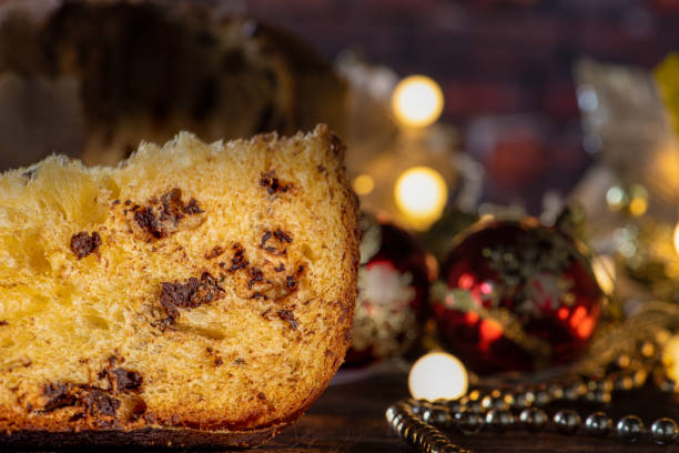 istock Chocotone, Christmas scene in low light with chocotone, dark background, selective focus. 1473998791