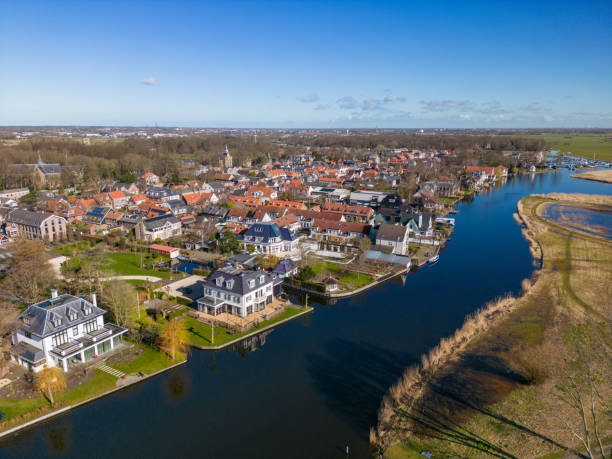 istock Warmond canal and village by drone 1474002196