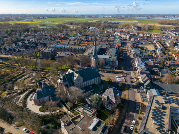 This aerial photo was made with a drone. It shows an old church in the small village of Voorhout, the Netherlands.