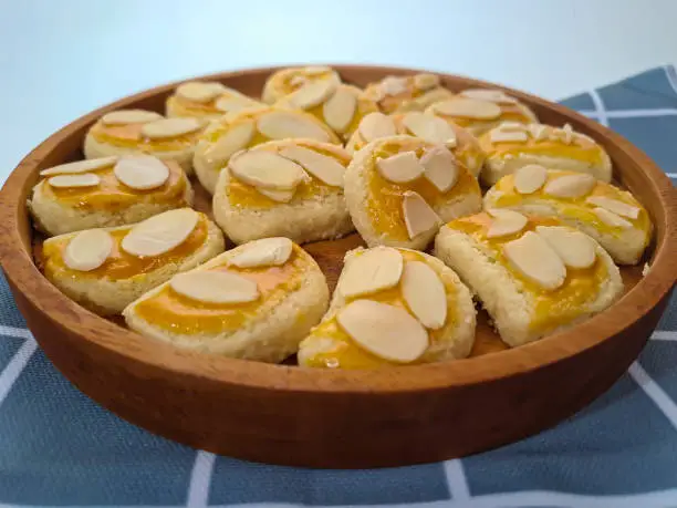 Photo of Peanut cookies on wooden plate