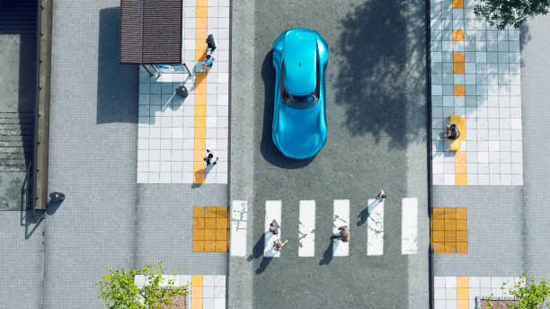 istock People at a zebra crossing in city while car stops 1474006279