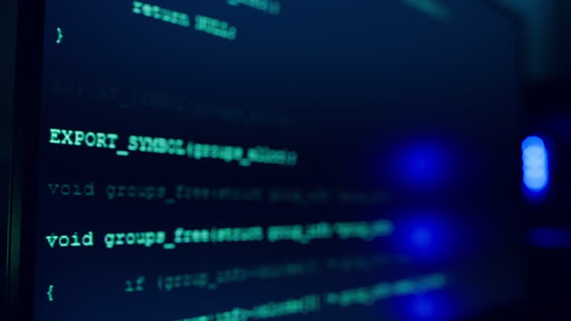 Code, screen and cybersecurity encryption for hacking, malware or malicious software programming at night. Display of coding or computer language or AI on dark web for UI virus or system information