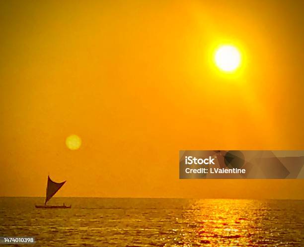 Outrigger Sunset Stock Photo - Download Image Now - Big Island - Hawaii Islands, Canoe, Color Image