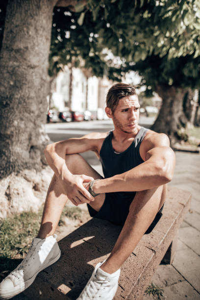 istock man resting in the city 1474010844