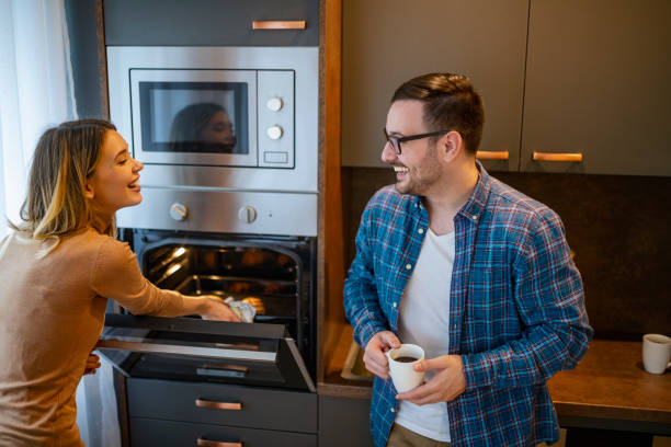 istock Happy couple in the kitchen 1474014323