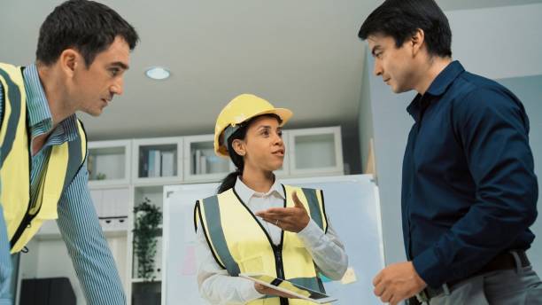 istock Engineers and competent employer discussing together with tablet in the office. 1474014625