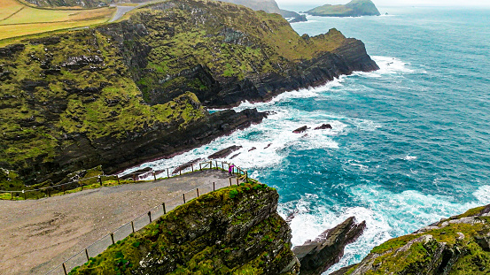 Cliffs in Ireland, Aerial view of Kerry Cliffs, Beautiful scenery of the Atlantic Ocean coastline, Ring of Kerry, Amazing wave lashed Kerry Cliffs, widely accepted as the most spectacular cliffs in County Kerry, Ireland, Atlantic ocean cliffs from above