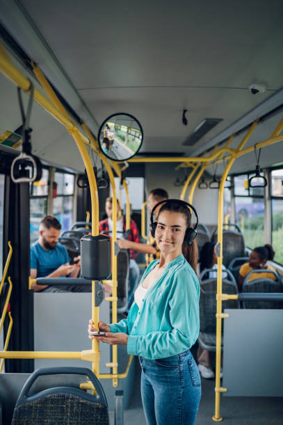 istock Woman riding in a bus and using a smartphone 1474019545