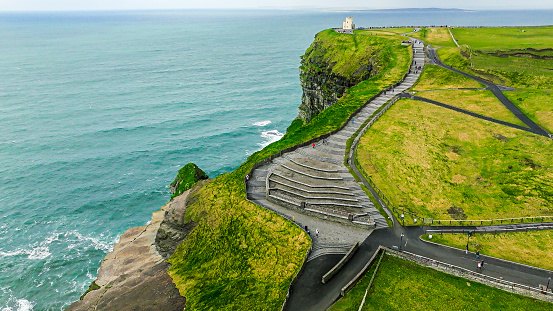 The Cliffs of Moher are sea cliffs located at the southwestern edge of the Burren region in County Clare, Ireland. The cliffs rank among the most visited tourist sites in Ireland, with around 1.5 million visits per year.