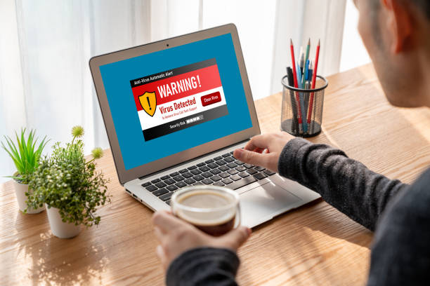 istock Virus warning alert on computer screen detected modish cyber threat 1474030995