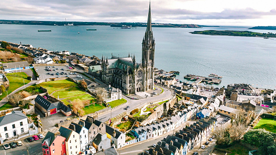 Cobh, known from 1849 until 1920 as Queenstown, is a seaport town on the south coast of County Cork, Ireland. With a population of around 13,000 inhabitants, Cobh is on the south side of Great Island in Cork Harbour and home to Ireland's only dedicated cruise terminal. Tourism in the area draws on the maritime and emigration legacy of the town.

Facing the town are Spike and Haulbowline islands. On a high point in the town stands St Colman's, the cathedral church of the Roman Catholic Diocese of Cloyne. It is one of the tallest buildings in Ireland, standing at 91.4 metres.