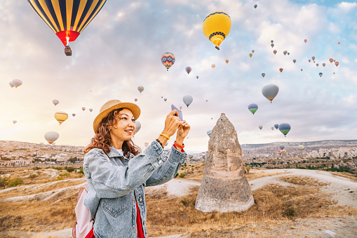 Find inspiration for your next adventure in Cappadocia, Turkey through the eyes of a talented travel blogger. This selfie captures a moment of awe and wonder.