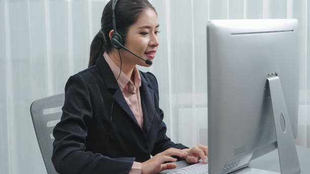 istock Enthusiastic female operator provide helpful customer service to customer. 1474054542