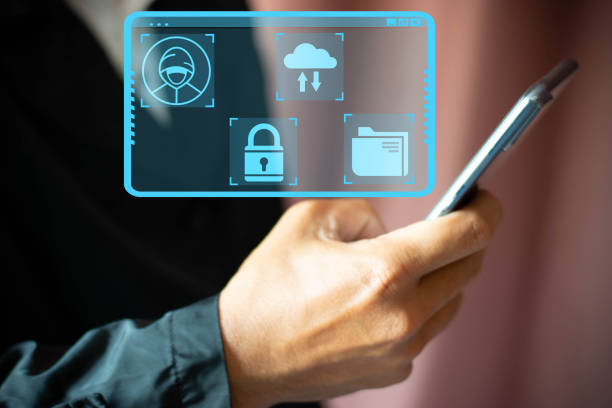 istock Mobile hacker and computer cyber security, online data breach or identity theft. hacked phone Hacker and mobile phone with hologram data Mobile scams, fraud or crime cyber security breach 1474057868