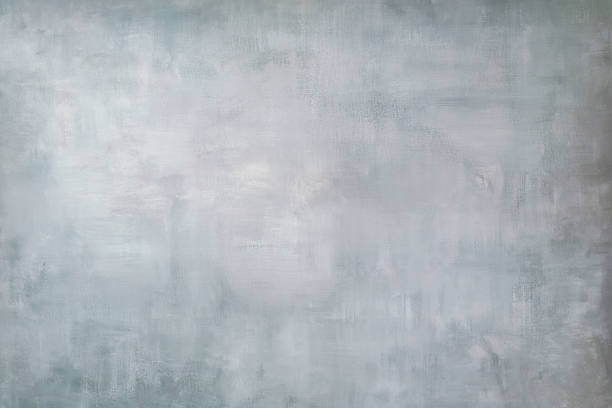 istock Texture of a smooth gray concrete wall. Gray concrete background texture with copy space. 1474064554