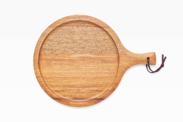 istock Empty wooden pizza platter set up on isolated on white background. Pizza tray on  on white background flat lay and copy space. 1474065680