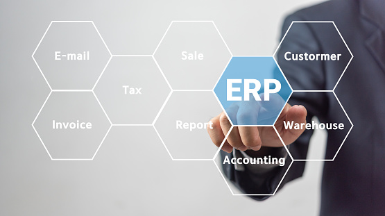 ERP Enterprise Resource Planning and AI Artificial Intelligence technology. using AI in ERP systems, such as automation, optimization, and data analytics marketing.Businessman touch virtual screen.
