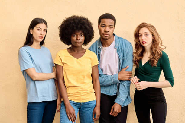 istock Four multiethnic serious people looking at camera 1474068531