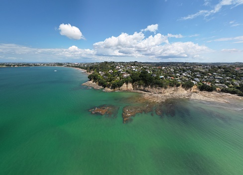 Picturesque coastline and farmlands in Victoria, Australia - wide aerial panorama